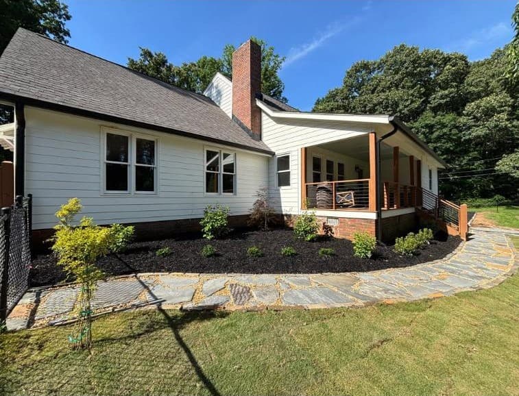 Curved flagstone walkway to the front porch